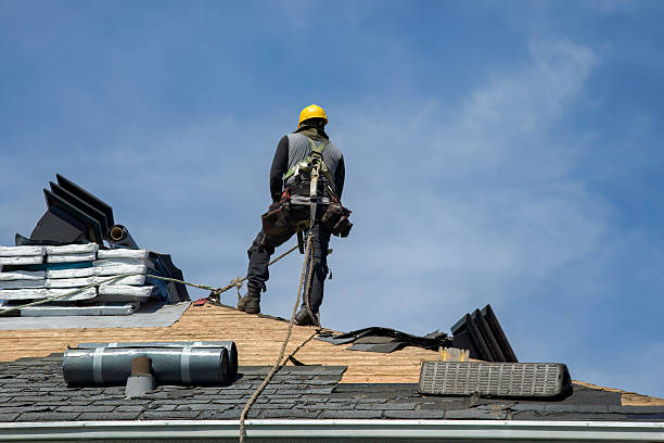 Professional Roof Replacement technician working in Bellevue, OH